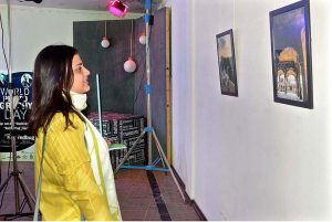 Visitors viewing photo exhibition entitled "Expression of Art, Culture and History through the Eye of a Camera held at the Al Hamra Event Air Theater Gallery