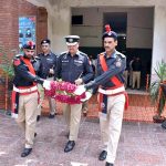 IG Railways Police Rao Sardar Ali Khan pays tribute to the fallen heroes of Railways Police on Police Martyrs Day, offering a respectful bouquet in their honor