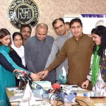 Dr. Ramesh Kumar Vankwani, Chairman PM's Taskforce on Gandhara Tourism and Patron-in-Chief Pakistan Hindu Council, cutting the Cake Independence day celebration after witnessing MOU signing ceremony between the Pakistan Hindu Council & the Legal Aid Society(LAS).