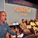 A poet is reciting poetry at the Sargodha Arts Council as part of the Independence Day celebration