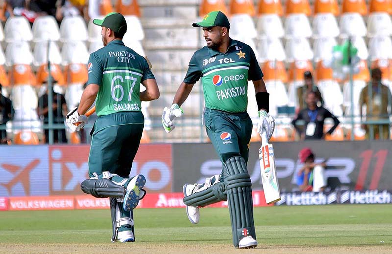 Pakistani player Babar Azam and Salman Ali Agha are running between the wicket during the First cricket match of Asia Cup 2023 between Pakistan and Nepal at Multan Cricket Stadium