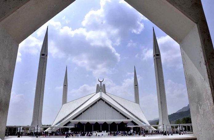 An attractive, eye catching view of thick hovering clouds over Faisal Mosque in Federal Capital