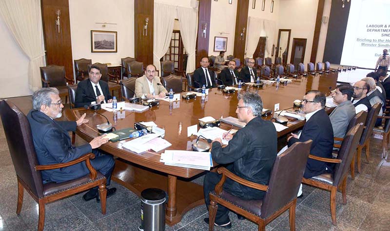 Caretaker Chief Minister Justice (Retd) Maqbool Baqar presides over a meeting of the Labour Department at CM House