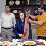 President Karachi Press Club Saeed Sarbazi and Secretary Sohaib Ahmed present traditional Ajrak to Federal Minister for Information and Broadcasting Marriyum Aurangzeb during her visit to Karachi Press Club