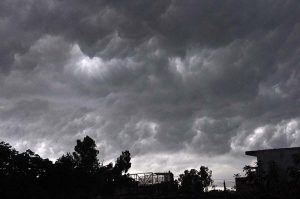 A view of dark clouds hovering over the city before rain
