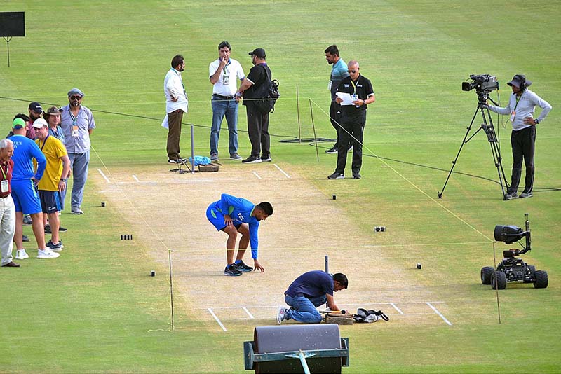 Pakistan Cricket team captain Babar Azam examines the pitch ahead of the first cricket match of Asia Cup 2023 at Multan Cricket Stadium
