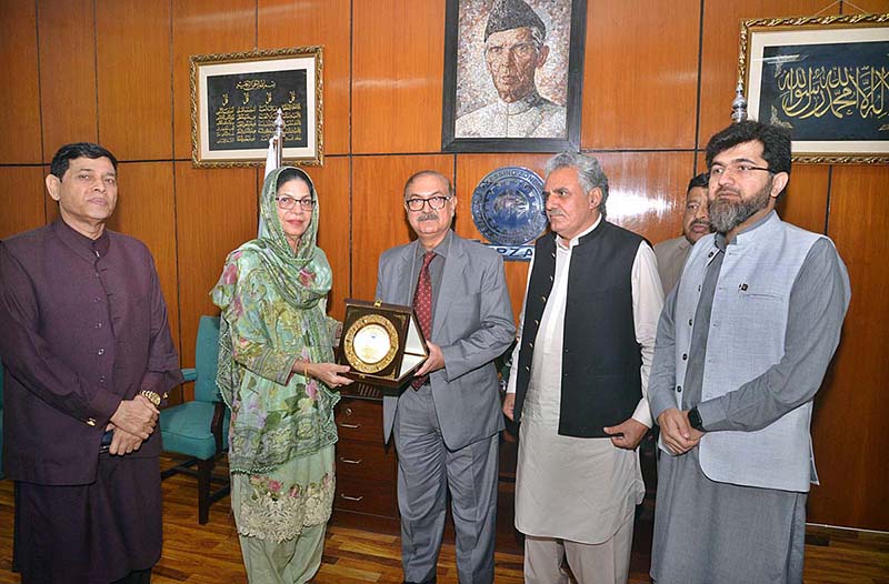 Chairman Export processing Zone( EPZA) Dr. Saifuddin Junejo, presenting shield to Chairperson Senate Standing Committee on Industries and Production Senator Khalida Ateeb during visit of Export Processing Zone (EPZ)