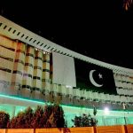 The National flag of Pakistan displayed on the Wapad House building in celebration of August 14 Pakistan Day