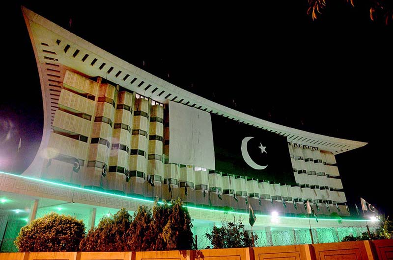 The National flag of Pakistan displayed on the Wapad House building in celebration of August 14 Pakistan Day