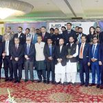 President Dr. Arif Alvi in a group photograph with other participants during the inaugural ceremony of Made in Pakistan Conference