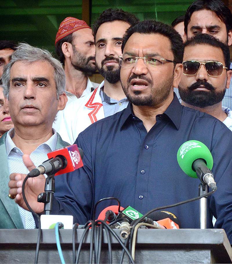 Caretaker Federal Minister for Human Rights Khalil George addressing a press conference at General Hospital.