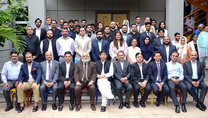 Federal Minister for IT &Telecom Syed Amin-ul-Haq in a group photo after the Graduation Ceremony of 8th & 9th COHORTS at National Incubation Center NED University