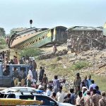A significant crowd has gathered at the site where 10 bogies of the Hazara Express derailed near Sarhari Railway Station, at least 15 passengers have lost their lives and over 50 have been injured, including women and children