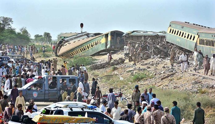 A significant crowd has gathered at the site where 10 bogies of the Hazara Express derailed near Sarhari Railway Station, at least 15 passengers have lost their lives and over 50 have been injured, including women and children