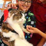 Participant poses with their pets during Pet Show organized at International School Clifton