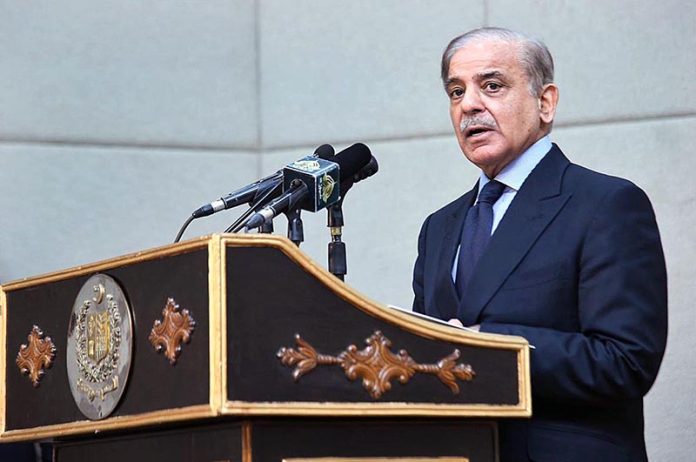 Prime Minister Muhammad Shehbaz Sharif addressing a ceremony of distribution of certificates of appreciation among the staff of PM Office and PM House