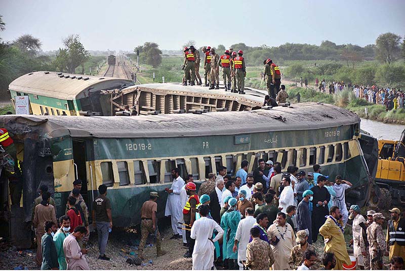 A significant crowd has gathered at the site where 10 bogies of the Hazara Express derailed near Sarhari Railway Station, at least 15 passengers have lost their lives and over 50 have been injured, including women and children