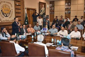 President and Chief Executive Officer (CEO) Faisal Bank Limited, Yusuf Hussain, Mufti Muhammad Najeeb Khan, President (SCCI) Abdul Ghafoor Malik are addressing to seminar on Islamic Banking