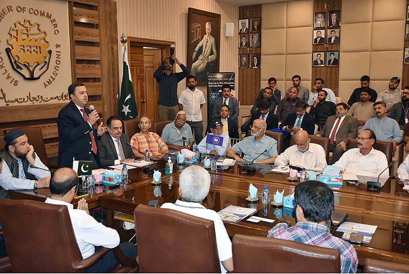 President and Chief Executive Officer (CEO) Faisal Bank Limited, Yusuf Hussain, Mufti Muhammad Najeeb Khan, President (SCCI) Abdul Ghafoor Malik are addressing to seminar on Islamic Banking