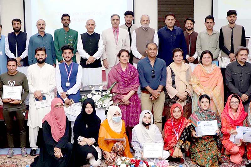 Chairman NTC Engineer Imtiaz Gilani and VC Karakoram International University Attaullah Shah distributing certificate among the participant during the one day Seminar on "Pakistan has to Make as per the vision of Quaid" at KIU