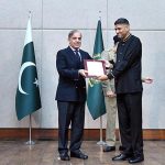 Prime Minister Muhammad Shehbaz Sharif distributing appreciation certificates among the staff of the PM House and PM Office