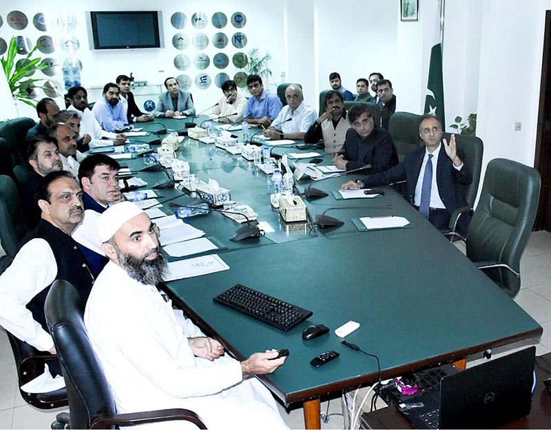 Caretaker Federal Minister for Commerce and Industry, Gohar Ejaz is being briefed at the Ministry of Industries and Production