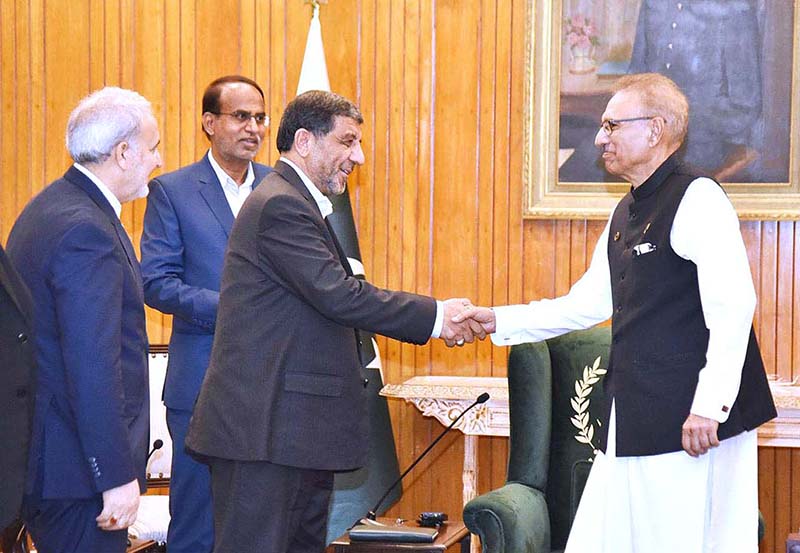 President Dr Arif Alvi welcomes the Iranian Minister for Cultural Heritage, Tourism, and Handicrafts, Syed Ezzatollah Zarghami, at Aiwan-e-Sadr