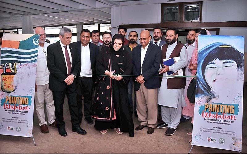 Senator Sehar Kamran cutting ribbon to inaugurate painting exhibition titled “Kashmir conflict through Art" organized by Department of Islamic Art and Architecture, International Islamic University Islamabad and Youth Forum for Kashmir in connection with Kashmir Siege Day to commemorate and show solidarity with our Kashmiri brother and sisters