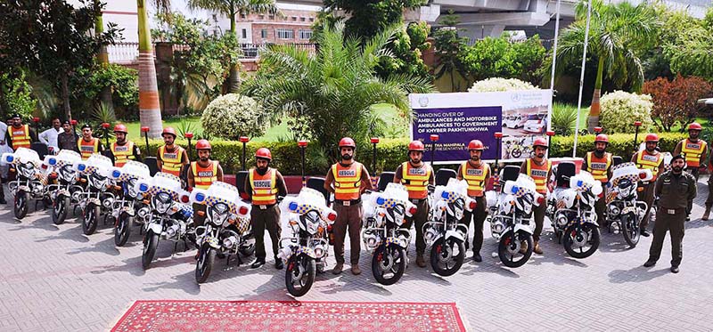 Head of sub-office, WHO Peshawar Dr. Palita Mahipala handing over fifteen motorbike ambulances and two mini ambulances for Rescue 1122 to Minister RR&SD Taj Muhammad at Rescue 1122 Head Quarter