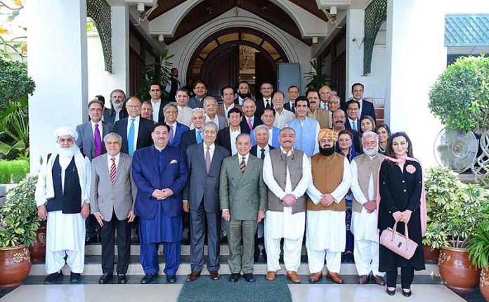 Prime Minister Muhammad Shehbaz Sharif in a group photo with members of the Federal Cabinet