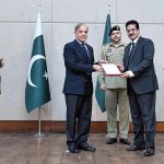 Prime Minister Muhammad Shehbaz Sharif distributing appreciation certificates among the staff of the PM House and PM Office