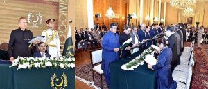 President Dr. Arif Alvi administering the oath of office to members of the caretaker Federal Cabinet, at Aiwan-e-Sadr