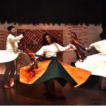 Artists performing on the stage during Khathak dance performance (Me Raqsam) directed by Makhna in collaboration with Lahore Arts Council at Al-Hamra