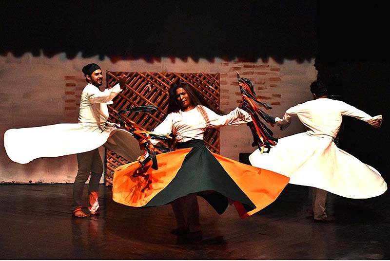 Artists performing on the stage during Khathak dance performance (Me Raqsam) directed by Makhna in collaboration with Lahore Arts Council at Al-Hamra