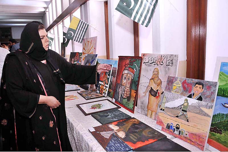 Senator Sehar Kamran cutting ribbon to inaugurate painting exhibition titled “Kashmir conflict through Art" organized by Department of Islamic Art and Architecture, International Islamic University Islamabad and Youth Forum for Kashmir in connection with Kashmir Siege Day to commemorate and show solidarity with our Kashmiri brother and sisters