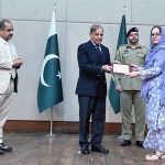 Prime Minister Muhammad Shehbaz Sharif distributing appreciation certificates among the staff of the PM House and PM Office