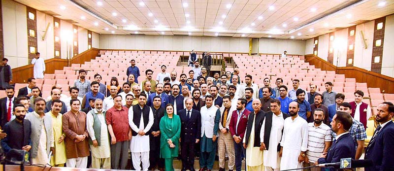 Prime Minister Muhammad Shehbaz Sharif in a group photo with Beat Reporters at Prime Minister's office