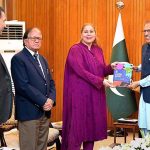 Chairperson National Commission for Human Rights (NCHR), Ms. Rabiya Javeri Agha, presents the Annual Report of NHCR for year 2021-22 to President Dr. Arif Alvi, at Aiwan-e-Sadr
