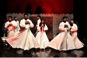 Artists performing on the stage during Khathak dance performance (Me Raqsam) directed by Makhna in collaboration with Lahore Arts Council at Al-Hamra