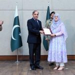 Prime Minister Muhammad Shehbaz Sharif distributing appreciation certificates among the staff of the PM House and PM Office