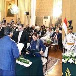 President Dr. Arif Alvi administering the oath of office to members of the caretaker Federal Cabinet, at Aiwan-e-Sadr