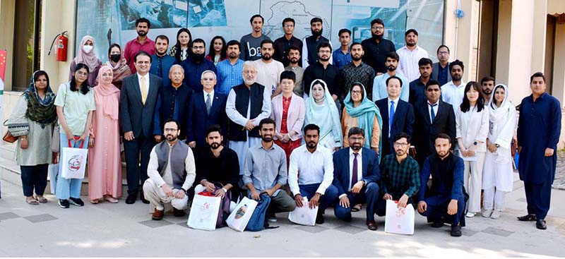 Group photo with Chairman HEC Dr. Mukhtar Ahmed, Chinese Charge d’Affaires Ms. Pang Chunxue, during the send-off ceremony for Scholars of Chinese Government Scholarship Program at HEC