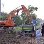 Machinery being used for extension work of Park Road during development work in the Federal Capital