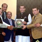 PRA President, Sadique Sajid presents appreciation shield to Speaker National Assembly Raja Pervez Ashraf for his support to PRA and for welfare of journalist community at Parliament House