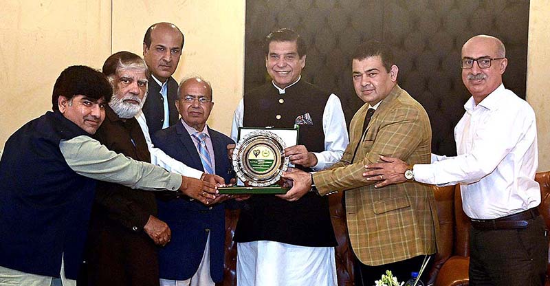 PRA President, Sadique Sajid presents appreciation shield to Speaker National Assembly Raja Pervez Ashraf for his support to PRA and for welfare of journalist community at Parliament House