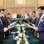 President Dr. Arif Alvi administering the oath of office to members of the caretaker Federal Cabinet, at Aiwan-e-Sadr