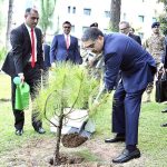 Caretaker Prime Minister Anwaar-ul-Haq Kakar planting a sapling during his visit to the Ministry of Foreign Affairs