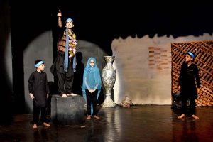 Participants of the training workshop students performing on the stage during a Theater play titled (Apne Madad Aap) directed by Rukhsana Khan and written by Syed Zeeshan in collaboration with Lahore Arts Council at Al-Hamra