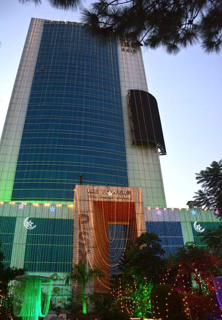 Pakistan Stock Exchange building is decorated with the lights in celebration of Independence Day