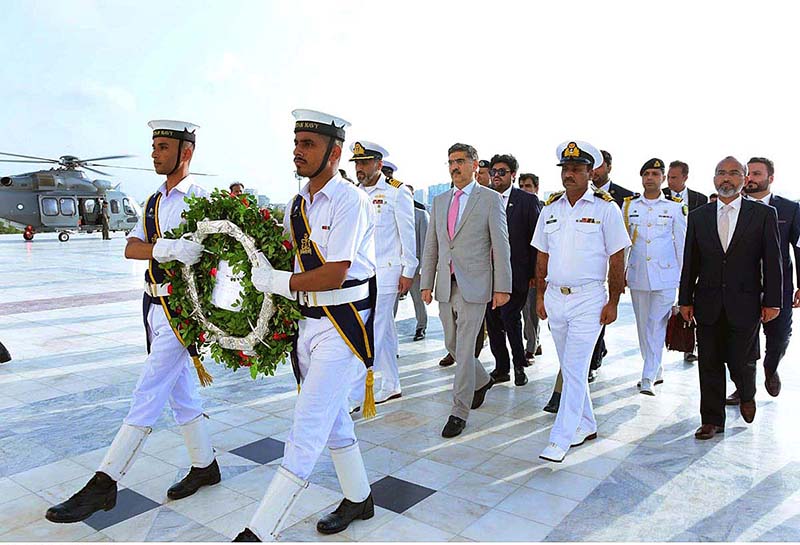 Caretaker Prime Minister Anwaar-ul-Haq Kakar laying floral wreath at the Mausoleum of Father of the Nation, Quaid-e-Azam Muhammad Ali Jinnah